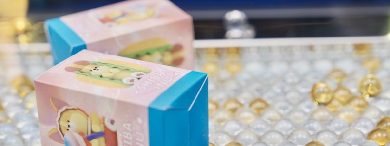 A close-up of exclusive, collectible Shiba Inu character prizes, showcasing the high-quality toys available as part of the Kako Claw experience.